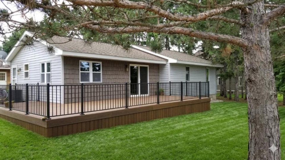 Ranch-style home with new composite deck and black railing